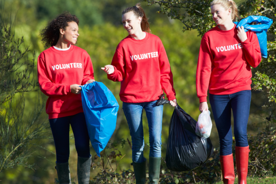 group of volunteers with bags